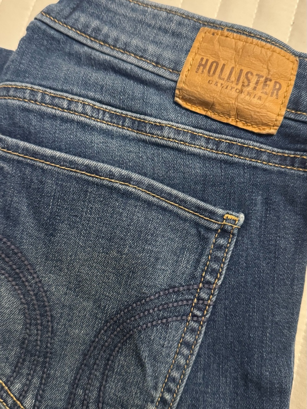 Hollister Dark Blue Denim Jeans with Brown Leather Patch